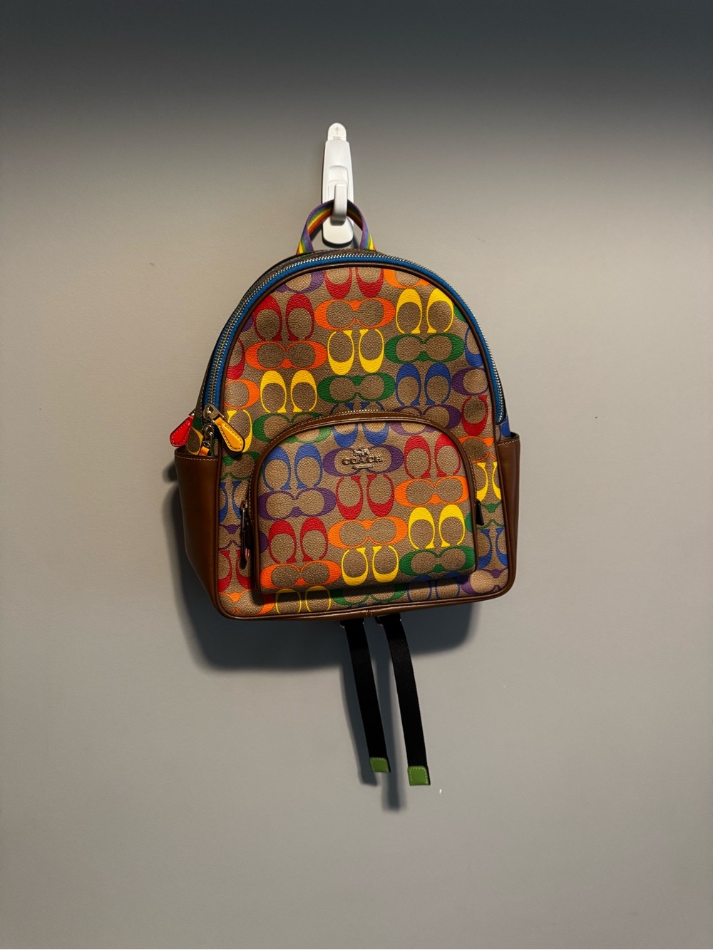 Coach Court Backpack in Rainbow Signature Canvas from Coach’s Pride Collection